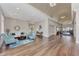 Spacious lobby featuring vaulted ceilings, modern decor, and elegant hardwood floors at 8731 52Nd E Dr, Bradenton, FL 34211