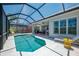 Inviting pool with screened-in lanai and exterior at 8731 52Nd E Dr, Bradenton, FL 34211