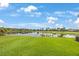 Backyard with a lake view and golf course at 9635 Discovery Ter, Bradenton, FL 34212