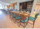 View of the dining room with long tables and chairs at the Waterlefe Golf & River Club at 9635 Discovery Ter, Bradenton, FL 34212