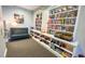Cozy community library with bookshelves and comfortable seating area at 9635 Discovery Ter, Bradenton, FL 34212