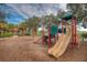 Community playground featuring colorful play structures, slides, and swings for outdoor fun at 9635 Discovery Ter, Bradenton, FL 34212