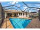 Backyard pool featuring beautiful screen enclosure at 9635 Discovery Ter, Bradenton, FL 34212