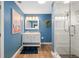 Stylish bathroom featuring a glass shower, vanity, and decor at 1040 Hope St, Venice, FL 34285