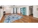 Spacious living room featuring hardwood floors, and access to the rest of the home at 1040 Hope St, Venice, FL 34285