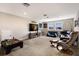 Large bonus room with entertainment center and comfortable seating at 11411 Spring Gate Trl, Bradenton, FL 34211