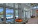 Bright lobby with pool views, featuring contemporary decor and ample natural light for an inviting atmosphere at 11603 Bluebird Pl, Lakewood Ranch, FL 34211