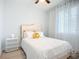 Inviting bedroom with a plush bed, soft lighting, and a serene ambiance at 11960 De Leon Dr, North Port, FL 34287