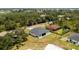 Expansive backyard on home exterior featuring lush green grass, providing a serene outdoor space at 11960 De Leon Dr, North Port, FL 34287