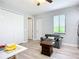 Bright living room features light-colored floors and walls, and comfortable seating at 11960 De Leon Dr, North Port, FL 34287