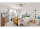 Bright, well-appointed bedroom showcases stylish furnishings and a calming color palette at 12230 Amica Loop, Venice, FL 34293