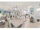 Bright dining area connected to the kitchen and living room at 12230 Amica Loop, Venice, FL 34293