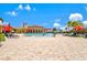 Resort style pool area, perfect for relaxation with lounge chairs and shade umbrellas at 12230 Amica Loop, Venice, FL 34293