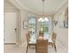 Cozy breakfast nook with a glass table, wicker chairs, and plenty of natural light at 13711 Messina Loop # 102, Lakewood Ranch, FL 34211
