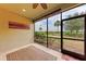 Screened lanai with outdoor carpet, and peaceful view of the green at 13711 Messina Loop # 102, Lakewood Ranch, FL 34211