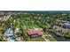 Enjoy breathtaking views from above this waterfront home boasting lush landscaping and a serene atmosphere at 1475 Bayshore Dr, Englewood, FL 34223