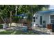 The patio features an outdoor dining area and a fire pit at 1801 Marilyn Ave, Bradenton, FL 34207
