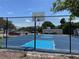 Well-maintained outdoor basketball court featuring blue playing surface and basketball hoops at 1801 Marilyn Ave, Bradenton, FL 34207