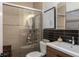 Modern bathroom with glass shower, ceramic tile, updated fixtures, and stylish decor at 1801 Marilyn Ave, Bradenton, FL 34207