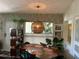 Charming dining room with unique lighting and decor at 1801 Marilyn Ave, Bradenton, FL 34207