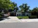 Charming single-story home with a well-manicured lawn and a boat in the driveway at 1801 Marilyn Ave, Bradenton, FL 34207