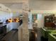 Bright and open kitchen with stylish white cabinets, a spacious island, and stainless steel appliances at 1801 Marilyn Ave, Bradenton, FL 34207