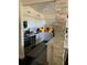 Modern kitchen featuring white cabinets, stainless steel appliances, and stylish countertops at 1801 Marilyn Ave, Bradenton, FL 34207