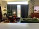 Comfortable living room with stylish decor, statement lighting, and unique accents at 1801 Marilyn Ave, Bradenton, FL 34207