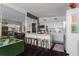 Open-concept living space with kitchen, dining, and living areas featuring stylish decor at 1801 Marilyn Ave, Bradenton, FL 34207