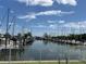 Scenic view of a marina filled with sailboats, showcasing tranquil waters and beautiful skies at 1801 Marilyn Ave, Bradenton, FL 34207