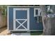 The backyard features a Tuff Shed with a white door and window box at 1801 Marilyn Ave, Bradenton, FL 34207