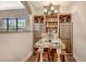 Home wet bar area with granite counter and wine refrigerators is perfect for entertaining guests at 1813 Boyce St, Sarasota, FL 34239