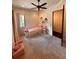 A cheerful bedroom with a single bed, plush toys, and soft pink accents at 1813 Boyce St, Sarasota, FL 34239