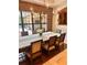 Bright dining room with a large table, a view of the pool, and elegant decor at 1813 Boyce St, Sarasota, FL 34239
