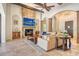 Inviting living room boasts a stone fireplace, wood beams, and elegant archways at 1813 Boyce St, Sarasota, FL 34239