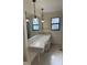 Bathroom with a vanity area, overhead lighting, and a large mirror for getting ready at 191 Maria Ct, Punta Gorda, FL 33950