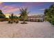 Expansive backyard with well-maintained landscaping and a serene view of the pool area at 1915 38Th W St, Bradenton, FL 34205