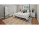 Bright bedroom features modern decor with wooden floors, neutral rug and mirror at 1915 38Th W St, Bradenton, FL 34205