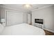 Bedroom featuring neutral walls, wood floors, and double closets at 1915 38Th W St, Bradenton, FL 34205