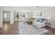 Cozy living room featuring neutral paint, modern furniture, and an open concept floorplan at 1915 38Th W St, Bradenton, FL 34205