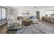 Spacious living room with modern furniture and decor, and an open concept to the updated kitchen at 1915 38Th W St, Bradenton, FL 34205