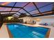 Stunning screened-in pool offers a private retreat for relaxation and recreation at 1915 38Th W St, Bradenton, FL 34205