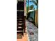 Outdoor area showcasing wooden steps, white gravel, and stepping stones by a decorative fence at 219 24Th W St, Bradenton, FL 34205