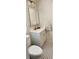 Well-lit bathroom featuring a vanity with mirror and patterned tile flooring at 219 24Th W St, Bradenton, FL 34205