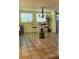 Bright dining area featuring an industrial-style table and stylish decorative chandelier at 219 24Th W St, Bradenton, FL 34205
