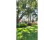 Charming home with well-maintained landscaping and a covered entrance at 219 24Th W St, Bradenton, FL 34205