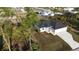 Aerial view of a home featuring a well-manicured lawn, ample backyard space, and a peaceful neighborhood setting at 2323 Zuyder Ter, North Port, FL 34286