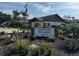 Well-maintained Country Village Clubhouse, surrounded by lush greenery and manicured landscaping at 2841 74Th St W # 2841, Bradenton, FL 34209