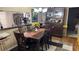 Dining room features a large table, seating for six, and decorative accents at 2841 74Th St W # 2841, Bradenton, FL 34209