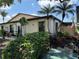 Inviting villa with vibrant landscaping, offering a serene and welcoming ambiance at 2841 74Th St W # 2841, Bradenton, FL 34209